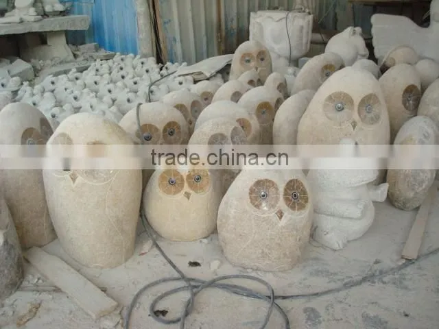 fish engraved river stone