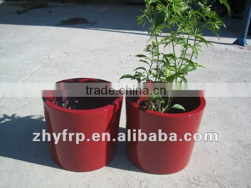 fiberglass or poly resin planters wanted