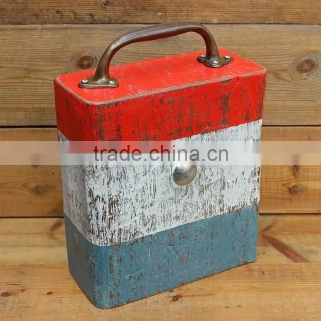 older aged wooden door stop