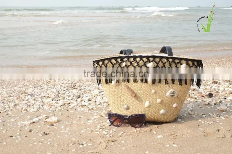 Seagrass beach bag with seashell decoration, cool design for summer holiday
