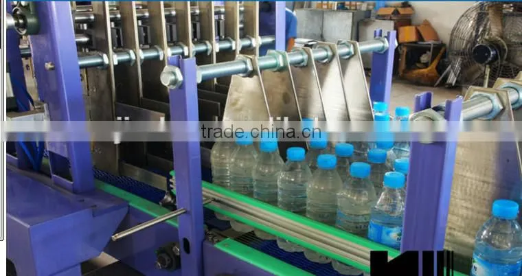 Professional full automatic film shrinking wrapping packing machine for PET bottle