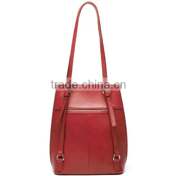 Multipurpose leather bag convert to a backpack from a shoulder bag