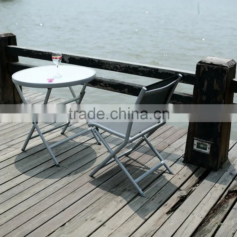 Metal folding table with silk screen printed stalinite top
