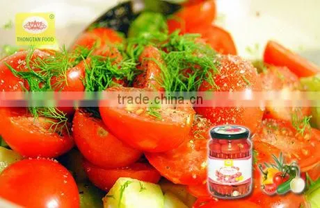 Tomatoes in tomato sauce in jar