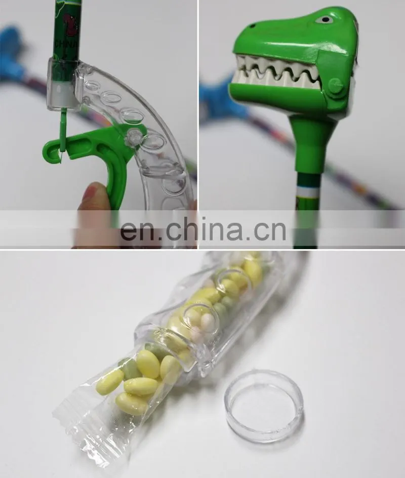 Wholesale funny game plastic dinosaur grabber toy with candy filled