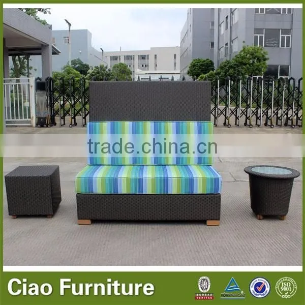 Outdoor Rattan Bench With Colorful Cushion Sitting