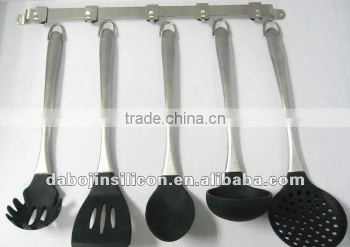 Fry pan handle coated with silicone rubber