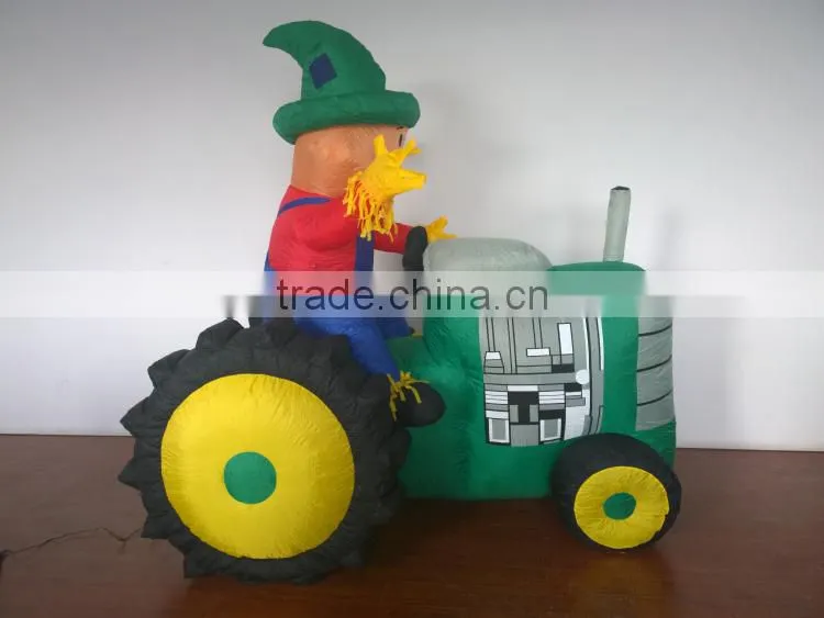 Animated Inflatable Farmer/Peasant Toy on Green Tractor with Yellow Wheels