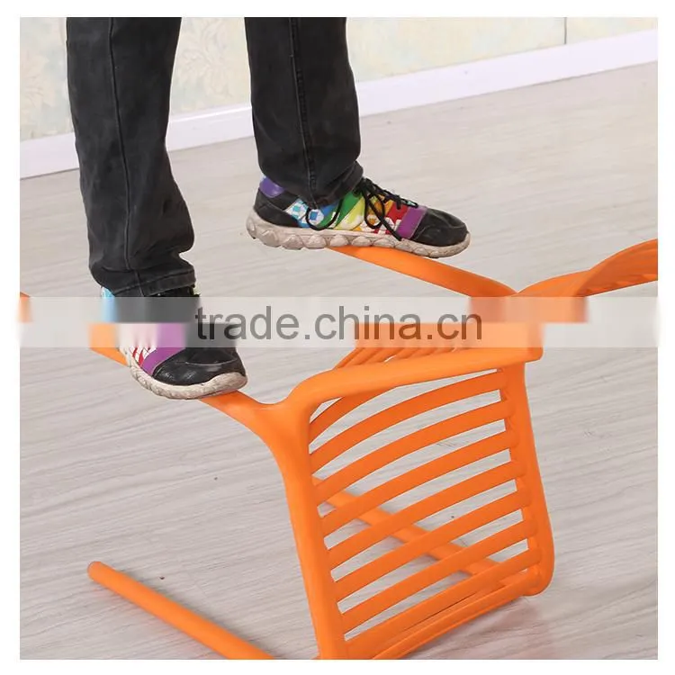 Simple stackable red plastic chair