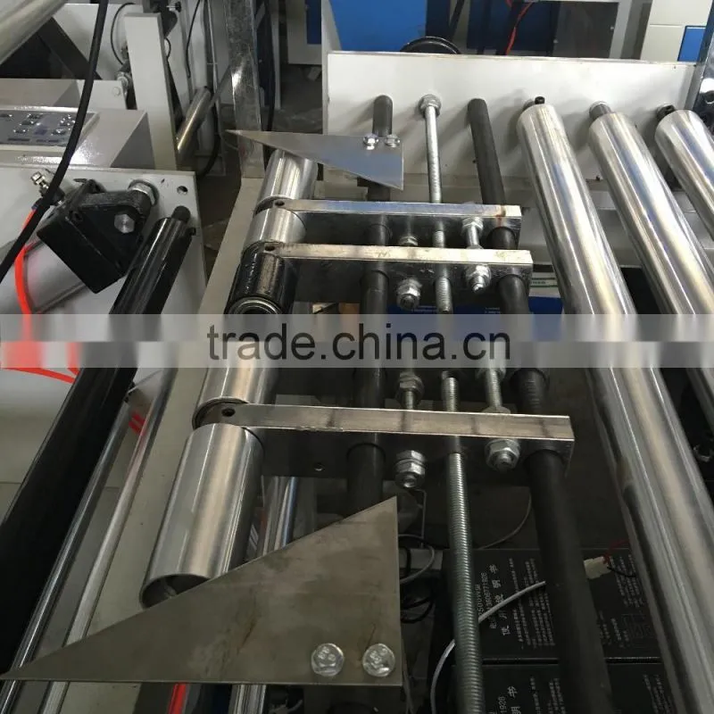 Automatic Non woven Fabric ultrasonic embossing roll to sheets cutting machine