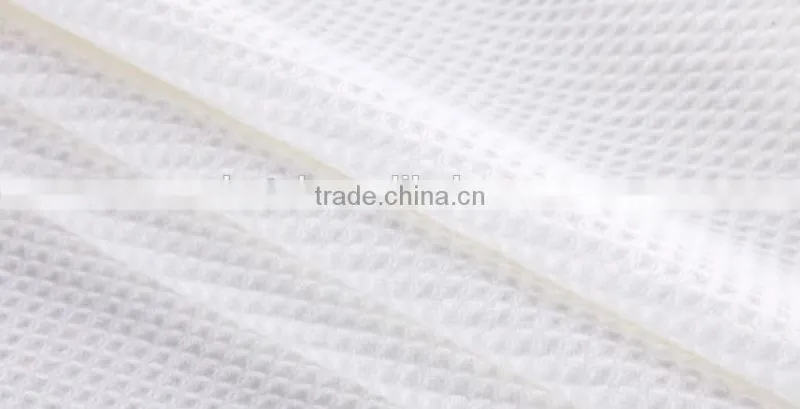 White waffle bathrobe for hotel / home