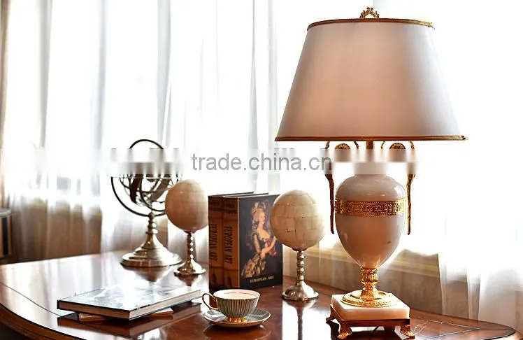 Graceful white color jade body brass bottom home use table lamp with fabric lampshade