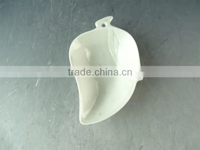 White small different shapes ceramic dishes / porcelain dishes