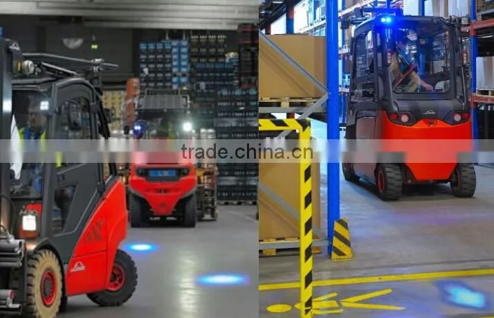 Forklift approaching blue warning light
