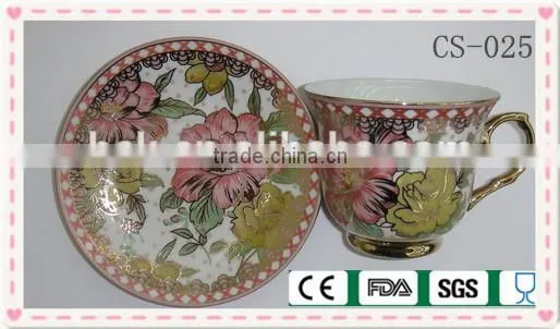 flower tea cup and saucer with gold rim