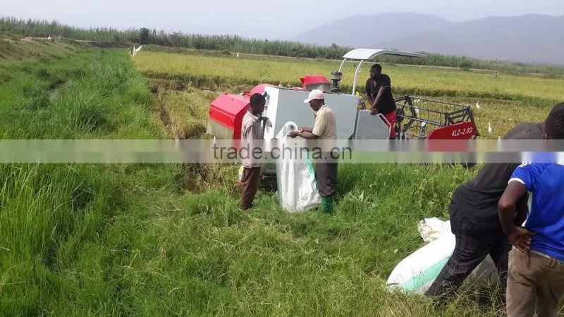 Crawler type mini grain harvester with driver seat