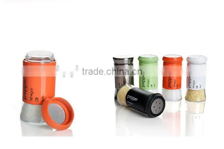 glass condiment bottle with stainless steel skin