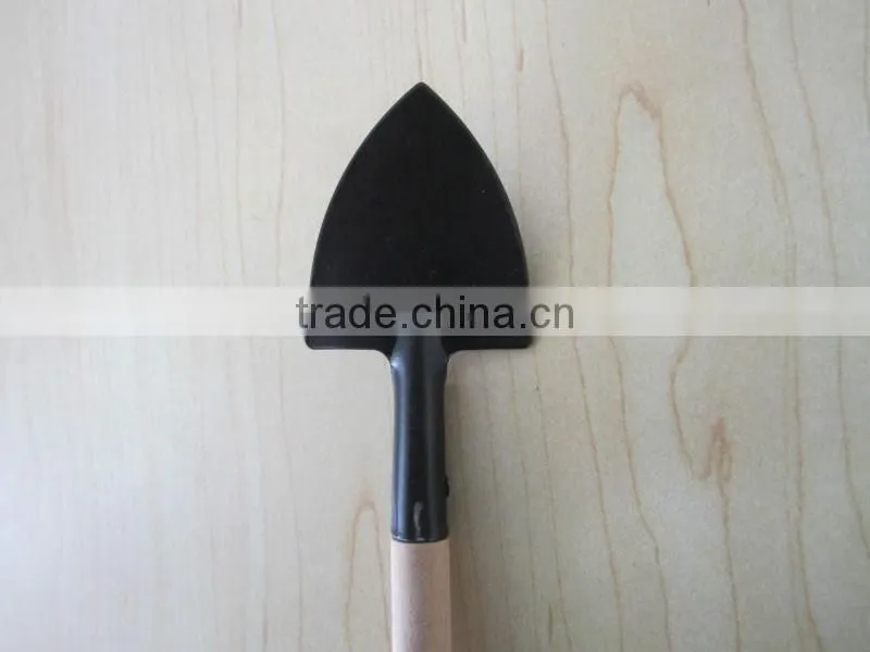 iron sapde with wooden handle garden tool wooden rake wooden shovel wooden spade