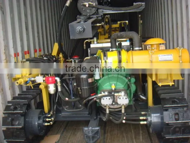 High Performance Low Cost Portable Tracked Drill for Boreholes