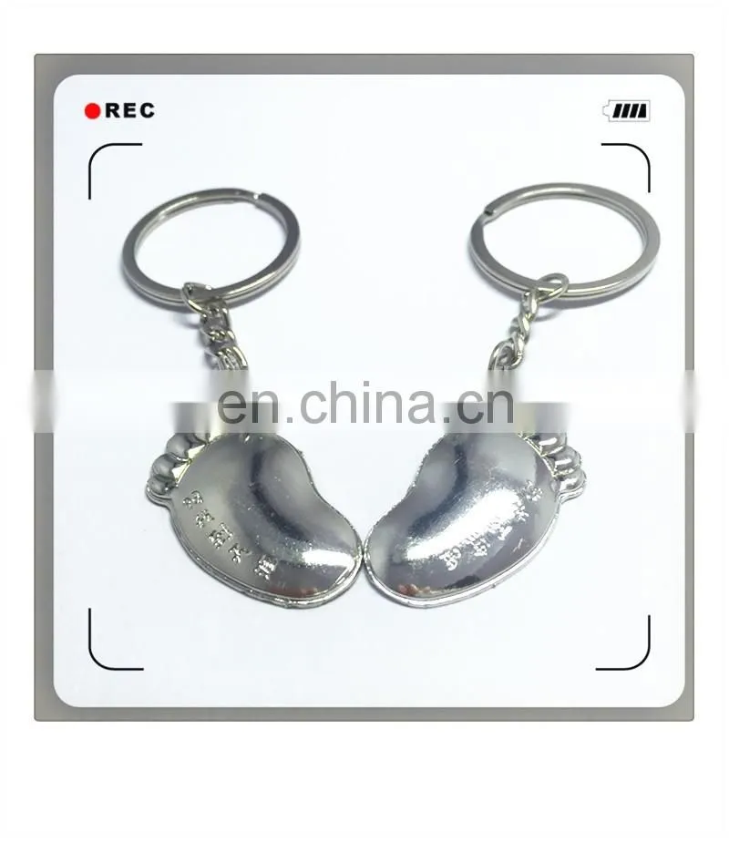 High quality metal couple keychain feet