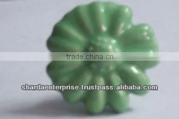 ceramic white knob with green circles