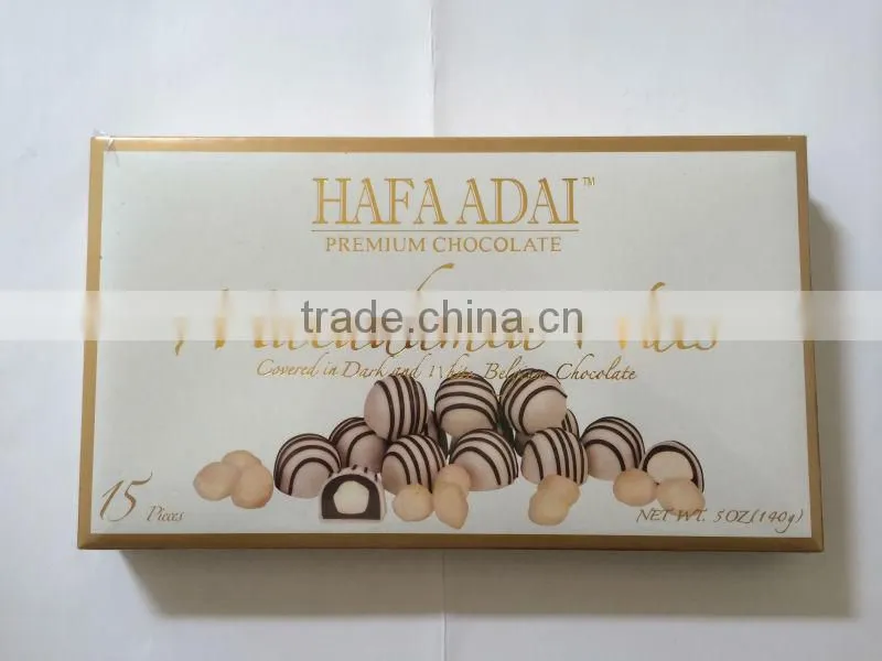 Macadamia Nuts covered in dark and white chocolate ball