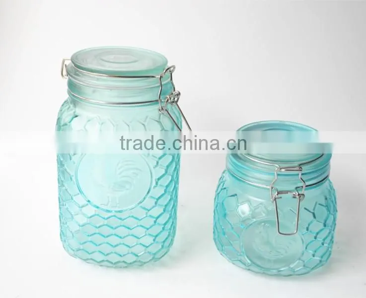 turquoise rooster embossed glass jar with metal clip fastening
