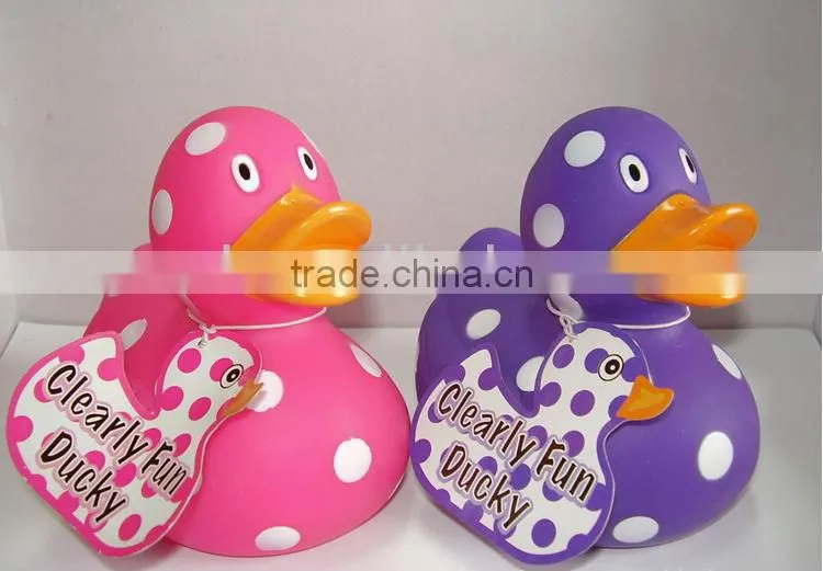 Speckled plastic duck with white dot