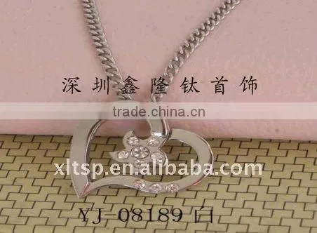 TC64 Pure Titanium Couple Love Pendant with Black Lucky Dophin