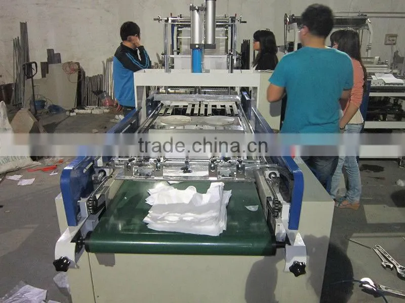 SHXJ-E full automatic T-shirt hot -sealing cold cutting bag making machine