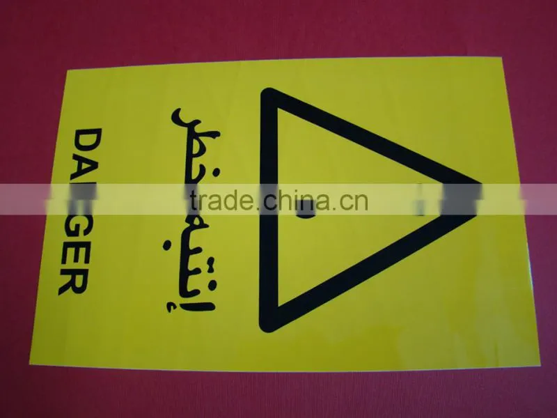 hanging construction sign with holes