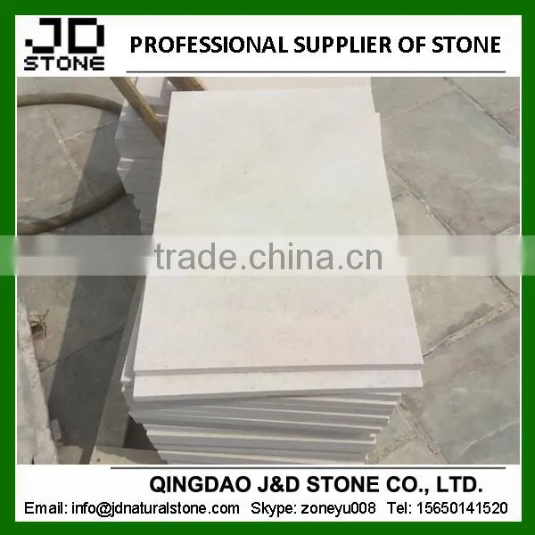 bush-hammered white sandstone paver