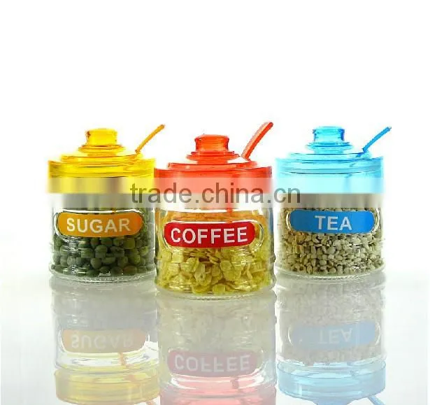 glass tea sugar coffee nut canister with easy open lid and spoon