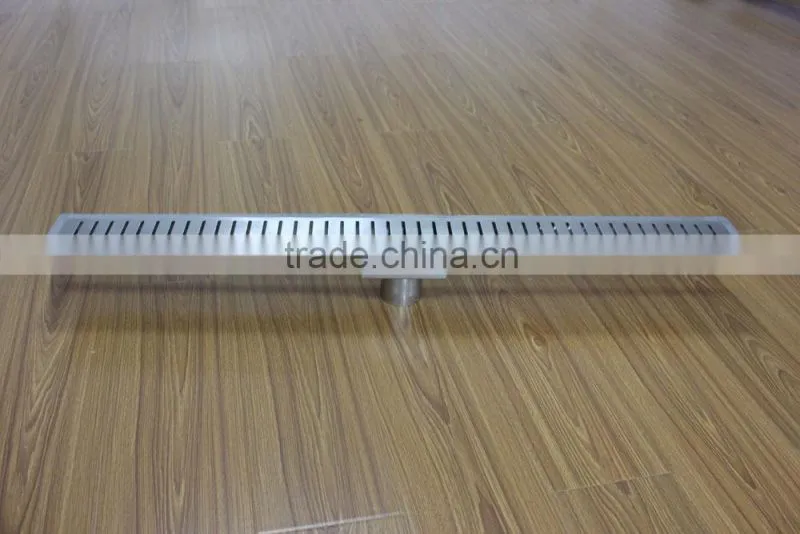 Sloped stainless linear shower drain. floor drain with vertical waste