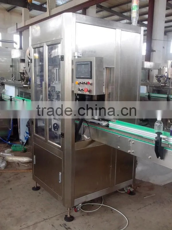 AUTOMATIC SLEEVE LABELLING MACHINE