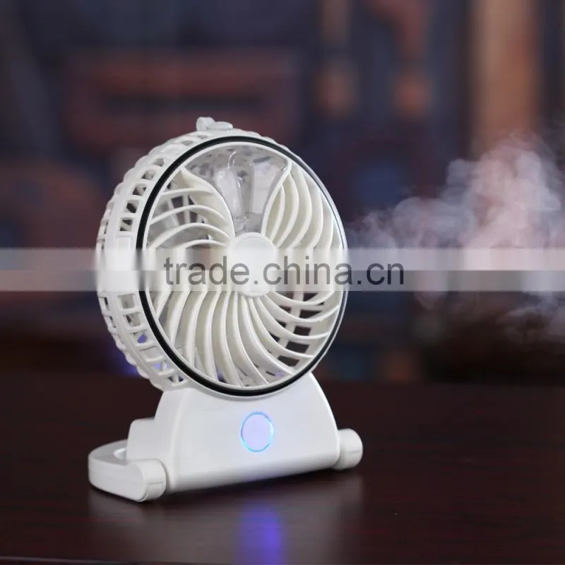 The new mini USB charging beauty spray fan humidification mini fan portable hand held air conditioner fan