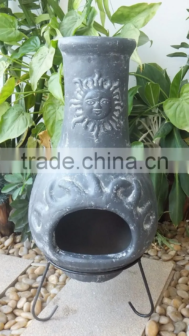 Outdoor sunset clay chimenea in grey color