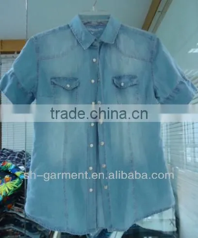 womans blue short sleeve shirt with two chest pockets 22