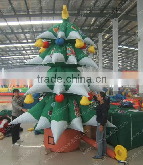 green snowing inflatable christmas tree