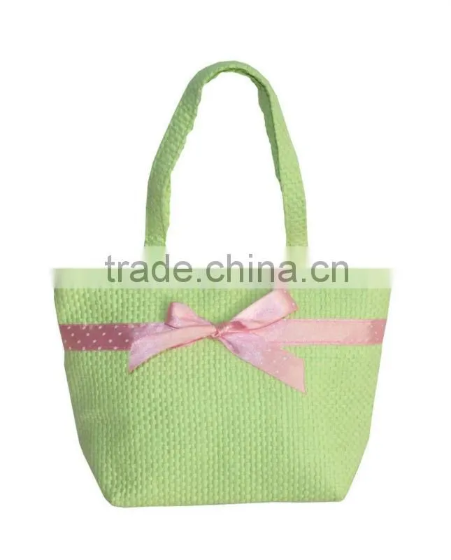Straw handbag with bows