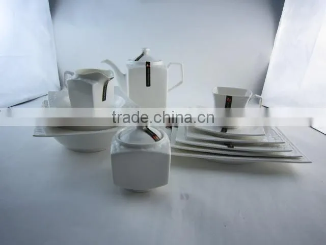 white porcelain dinner set with tea pot