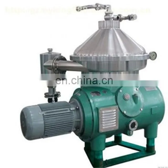 Continuous flow milk fat clarifier
