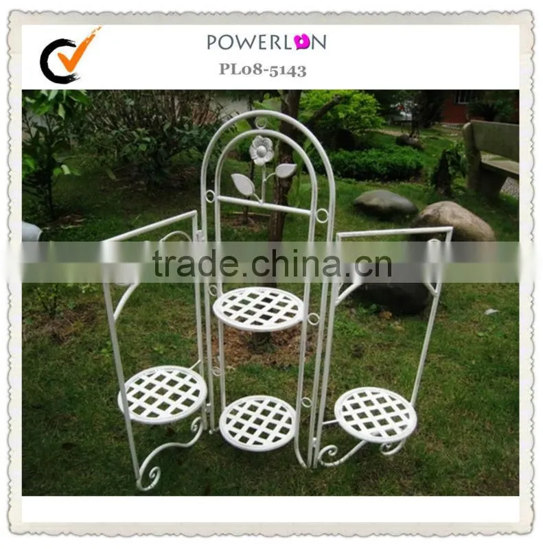 Antique metal plant pot trellis