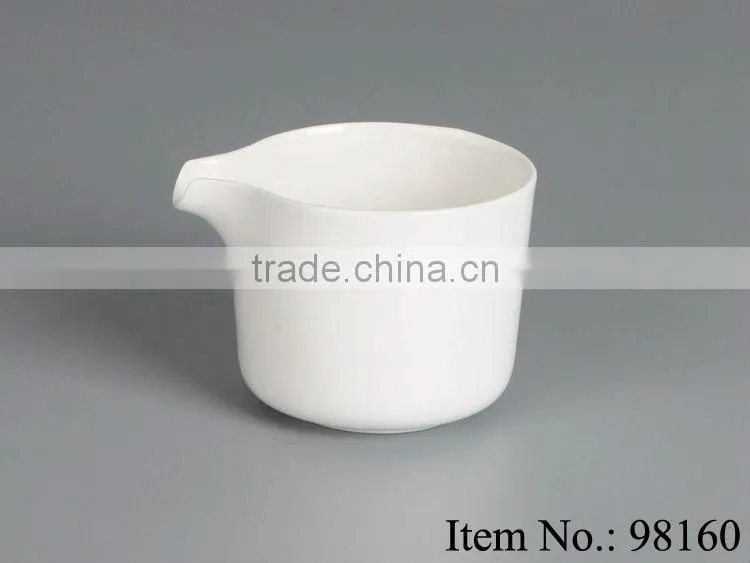 delicate white ceramic coffee creamer