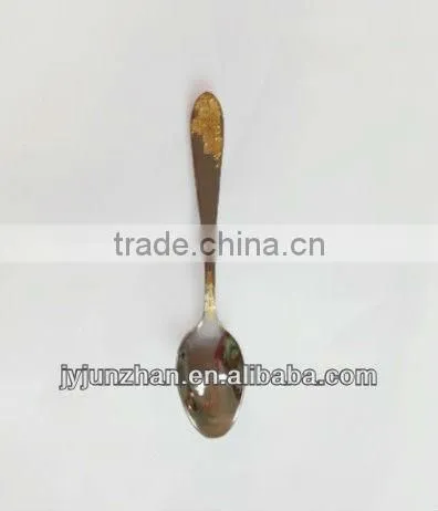 Metal teaspoon with logo with mirror polishing and golden color