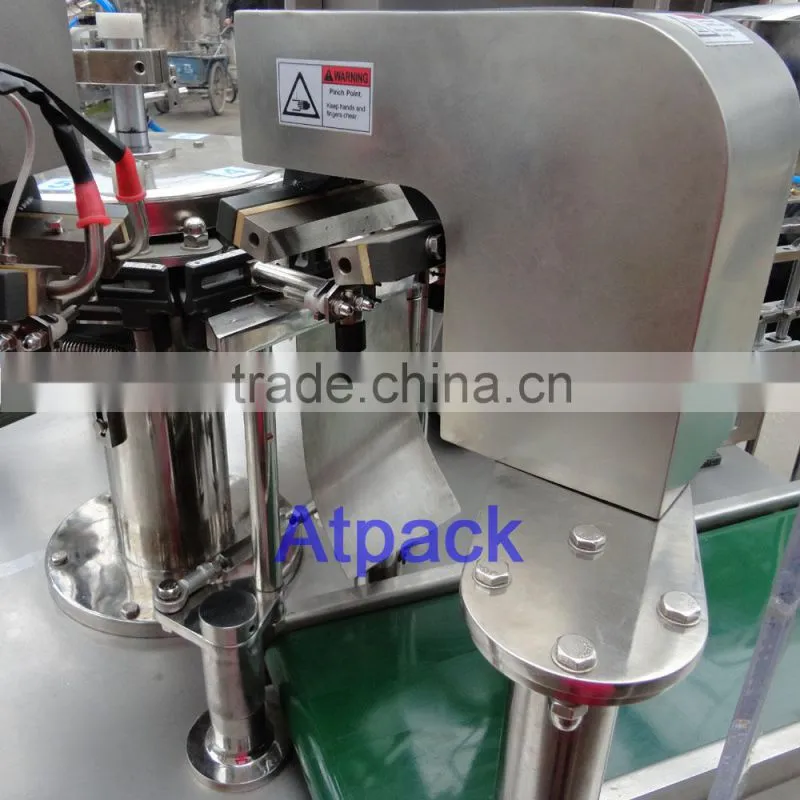 Hand sanitizer pre-made pouch filling and sealing machine
