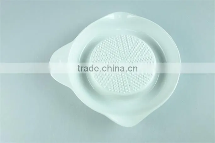 Ceramic hand lemon squeez / fruit squeeze tool