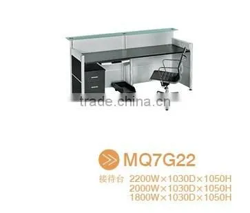 Black tufted reception desk made with tempered glass