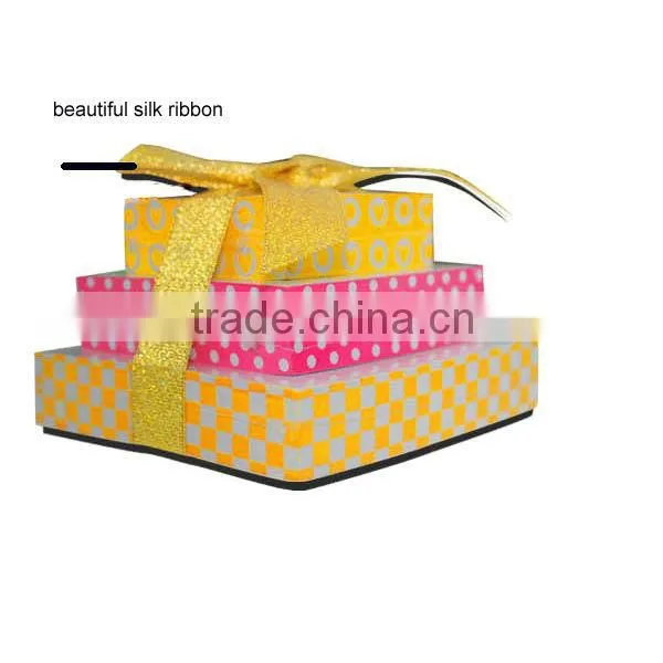 Tower shape paper cube with silk ribbon by shrink film memo pad