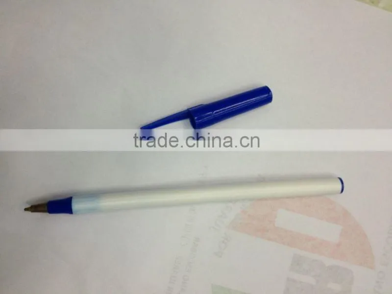 white blue ball-point pen